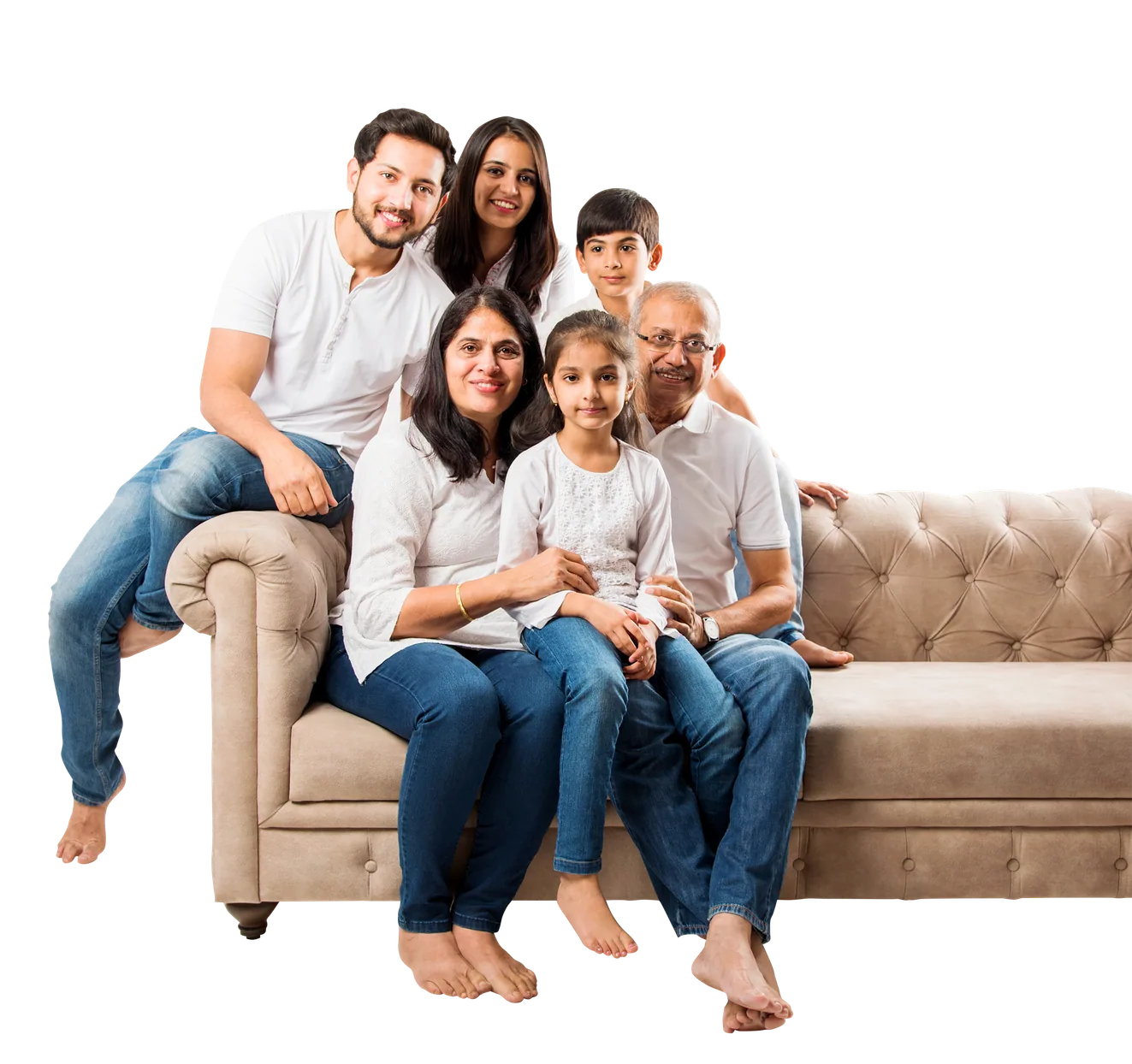 A multi-generational Indian family relaxing together on a sofa in their Rohan home